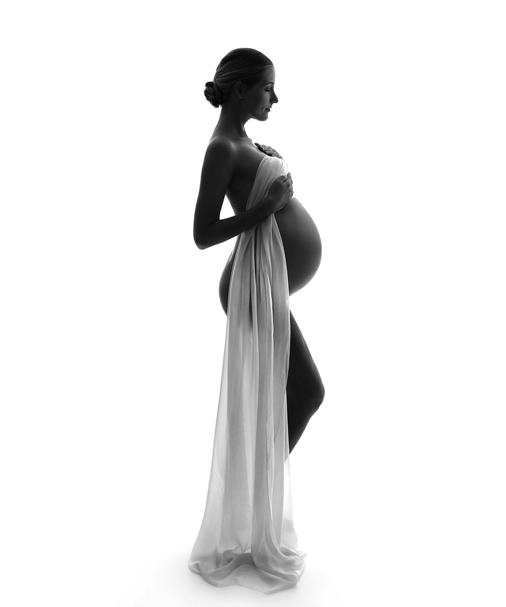 pregnant belly white fabric silhouette
