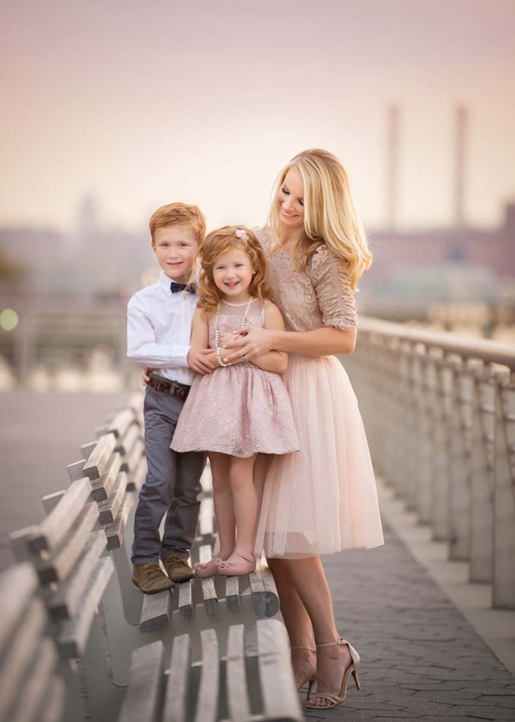 Stylish family posing for a portrait in NYC
