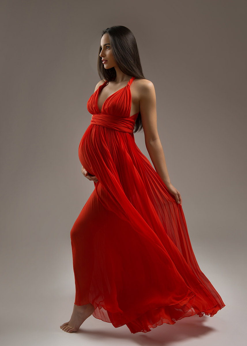 Maternity model in a red dress