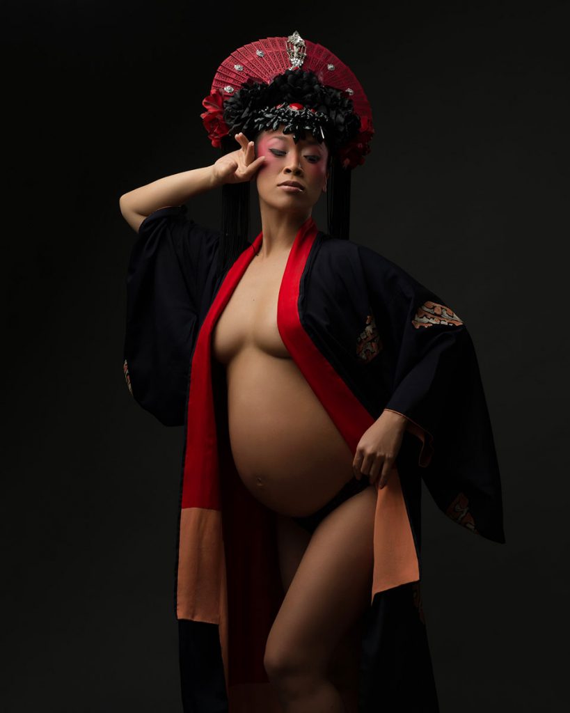 Maternity portrait of a woman wearing traditional kimono