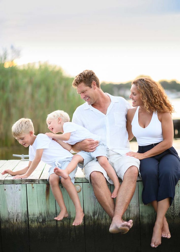 Candid moment shared by this family taken at a marina in the Hamptons
