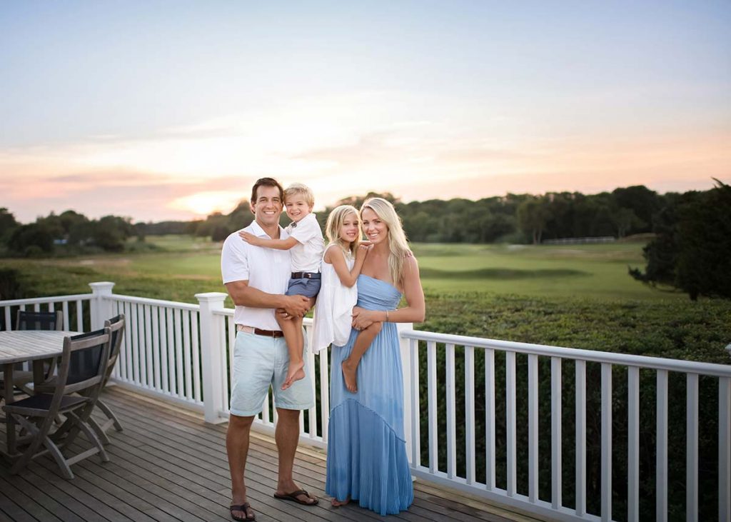 Sunset themed family portrait with a golf course in Westhampton