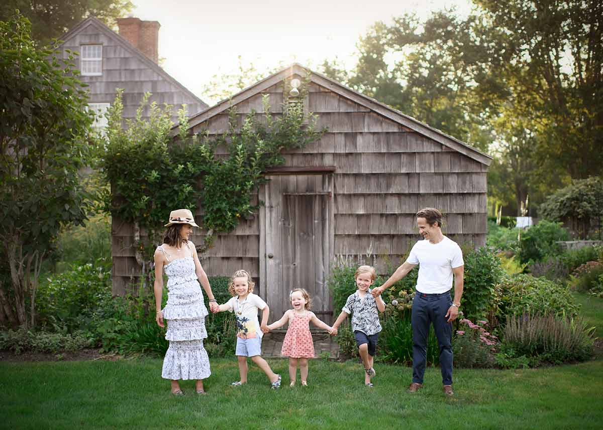 Children are laughing along with Mom and Dad at this beautiful Hamptons farm.