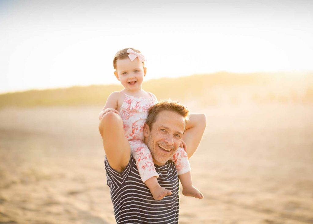 sunset-hamptons-father Candid portrait of a father and his daughter at a beach in Southampton NY