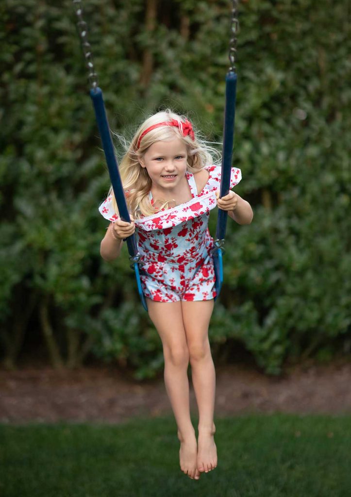 swing-girl-fun Young girl on a swing in Bridgehampton NY