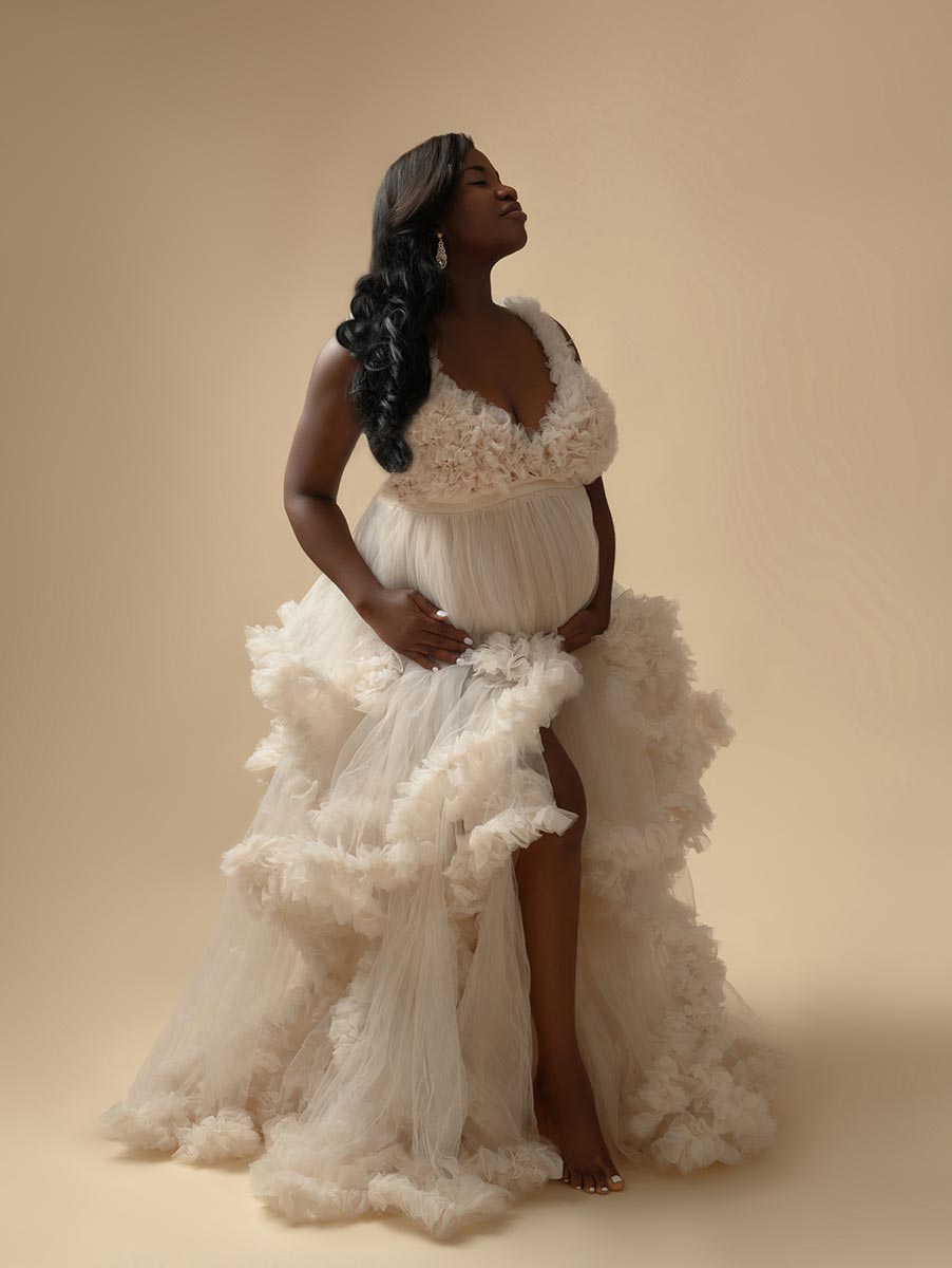 Pregnant woman wearing a puffy maternity dress