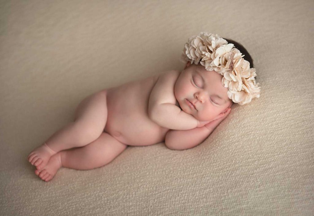 sleeping baby with a cute headband