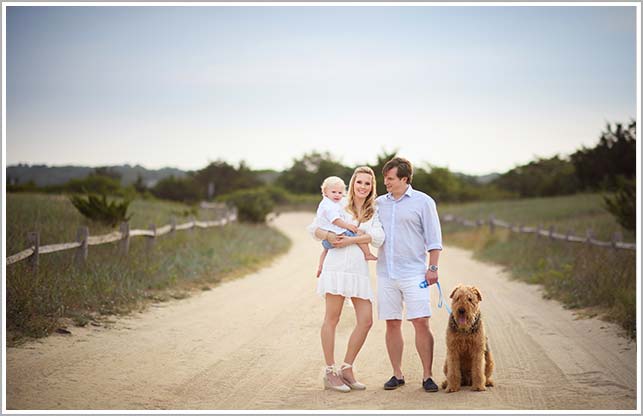 A country road in the Hamptons, NY makes a perfect setting for this modern family portrait of a stylish NYC family.