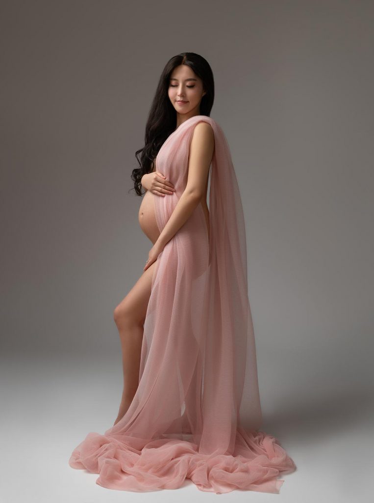 Pink silk fabric maternity photo shoot