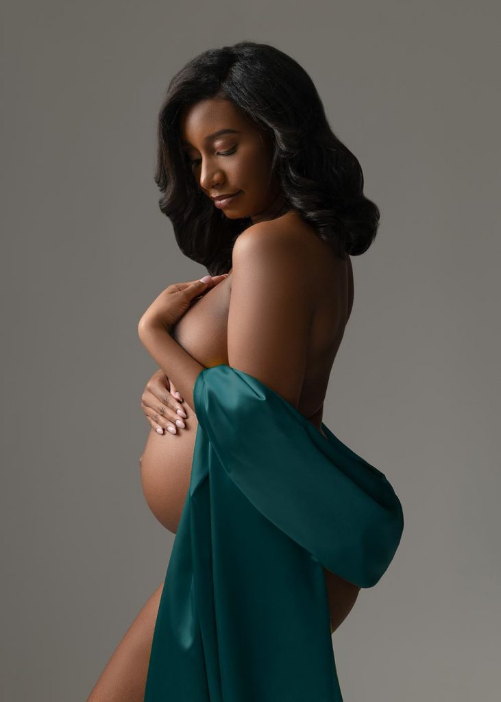 Topless maternity photo taken at a NYC photo studio