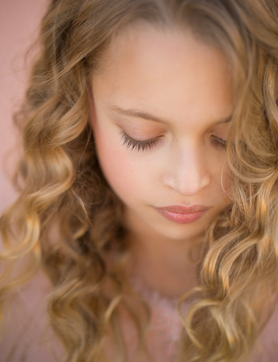 fine art teen eyelashes closeup with pink makeup
