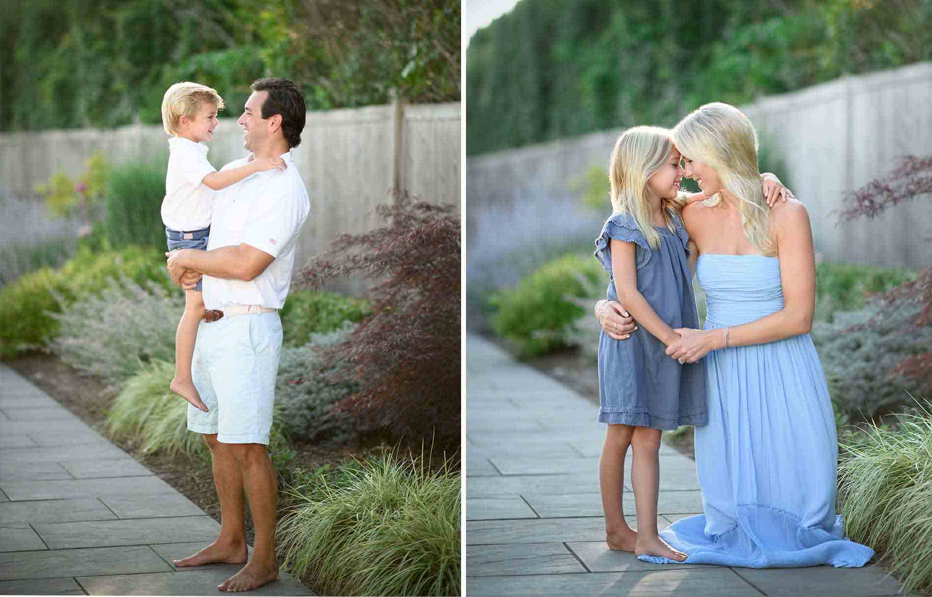 Left: A man wearing a white shirt and shorts holds a young boy in matching white and blue attire. Right: A woman in a light blue dress kneels and embraces a young girl in a blue dress. Both scenes are outdoors with greenery in the background.