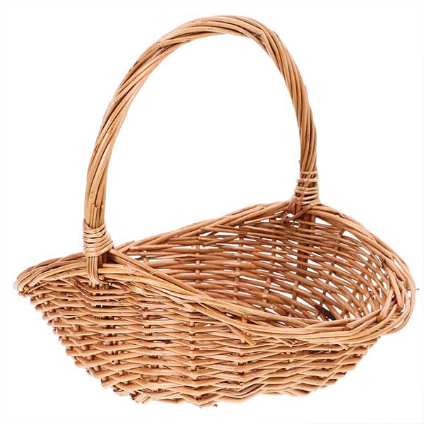 A light brown wicker basket with a sturdy handle, empty and shown against a white background.